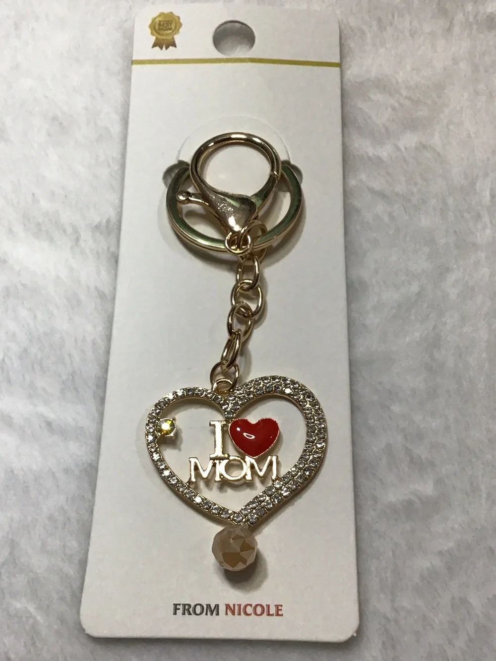 Nicole Gold-Tone Heart Keychain with Red Heart Accent